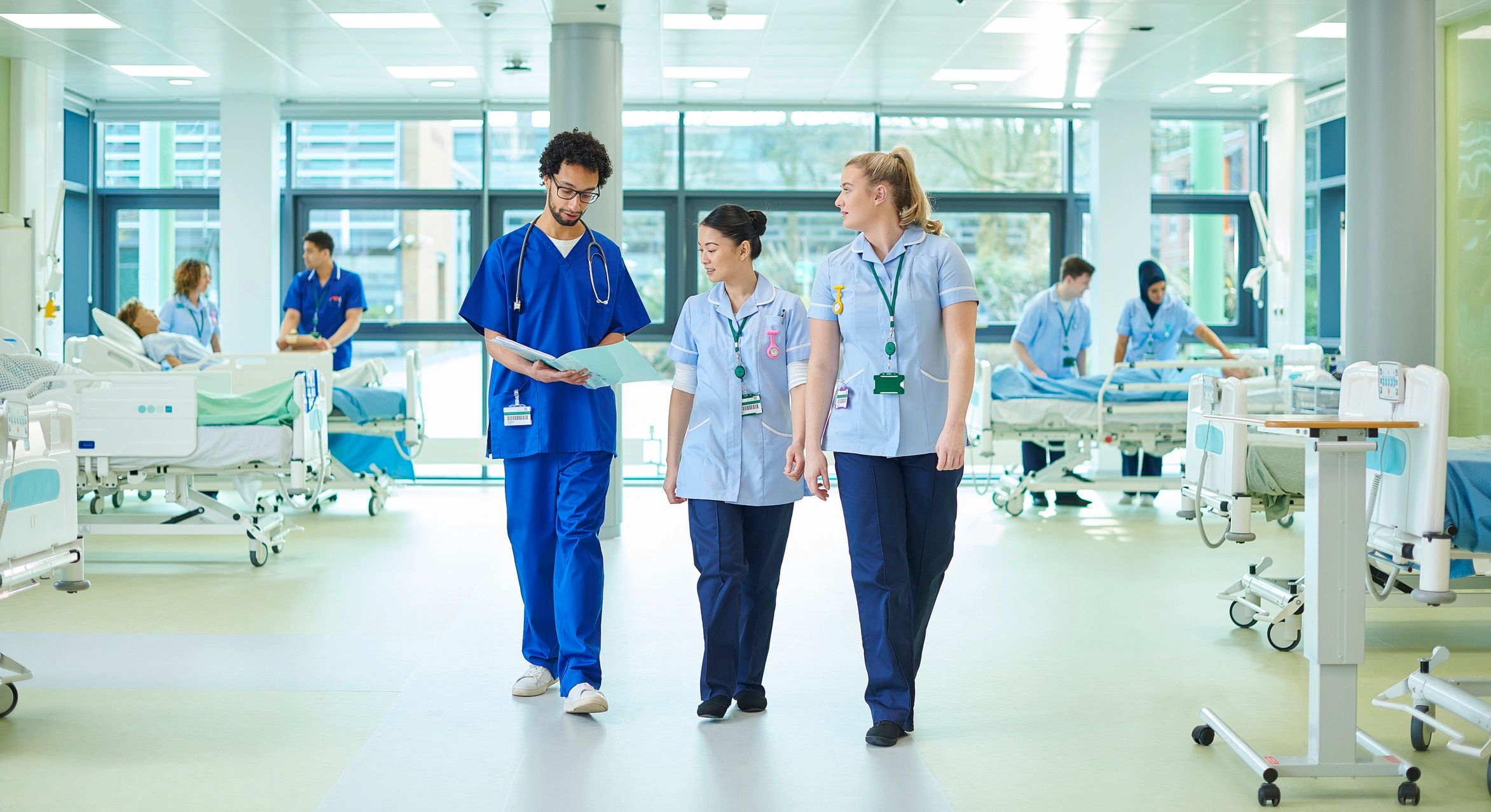 Nursing team collaborating on a hospital ward