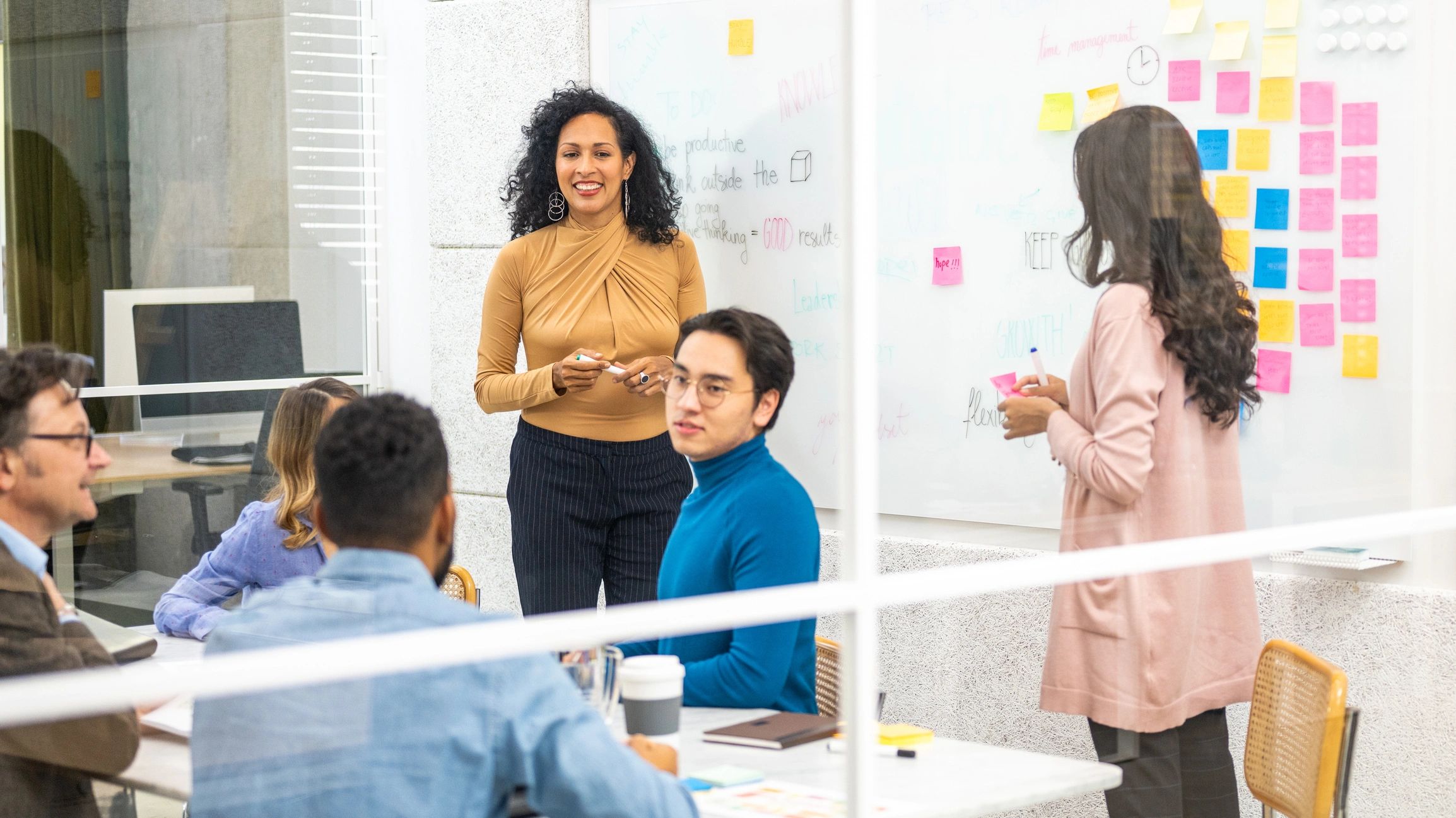 Managers collaborating on institutional planning in a conference room