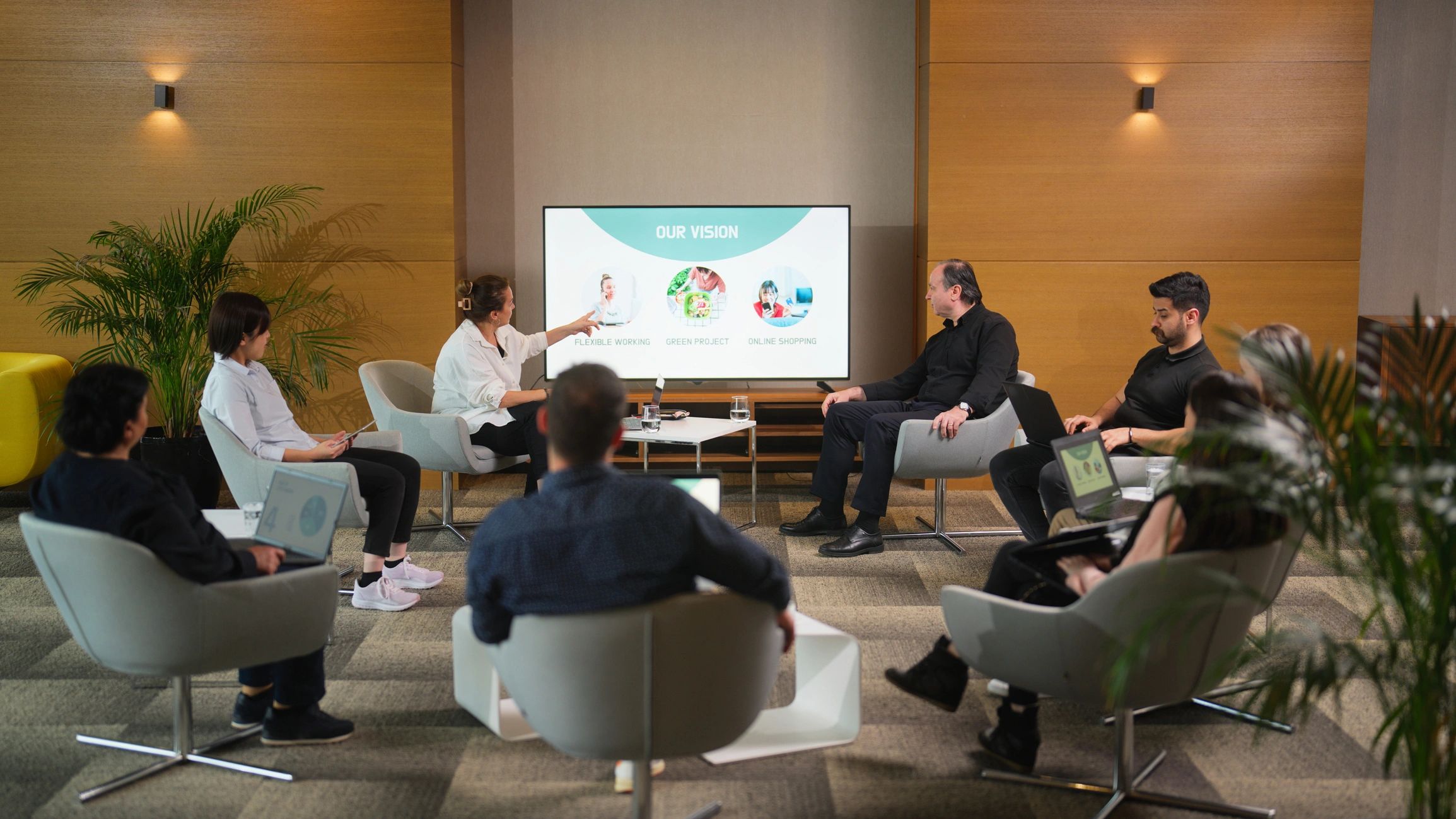 Executives collaborating during a strategy presentation