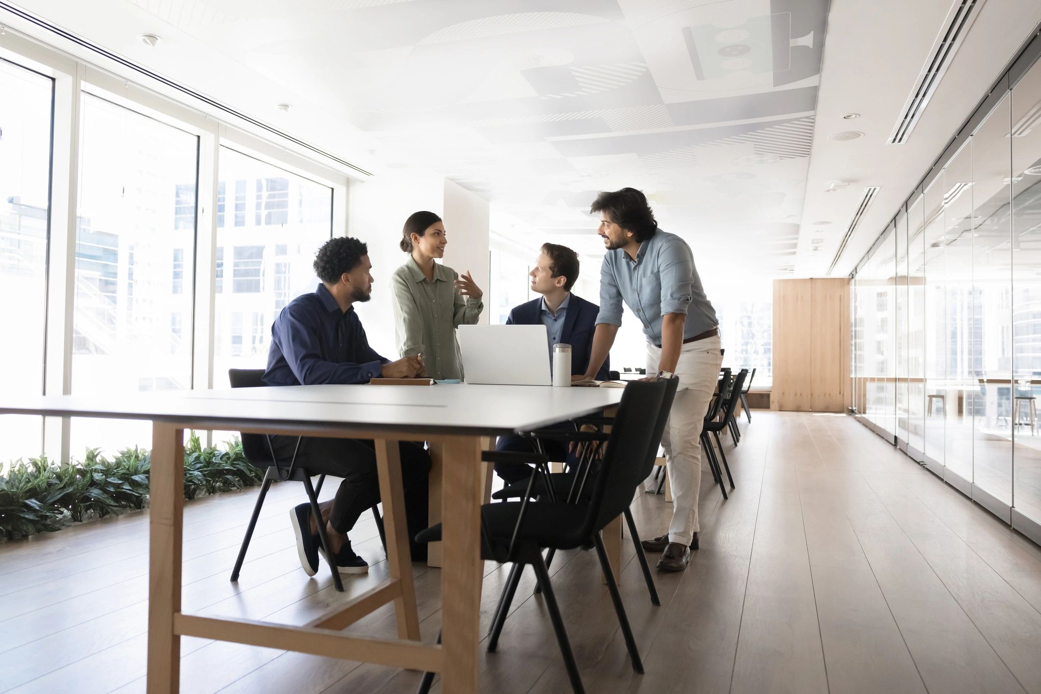 Consulting team collaborating at a meeting table