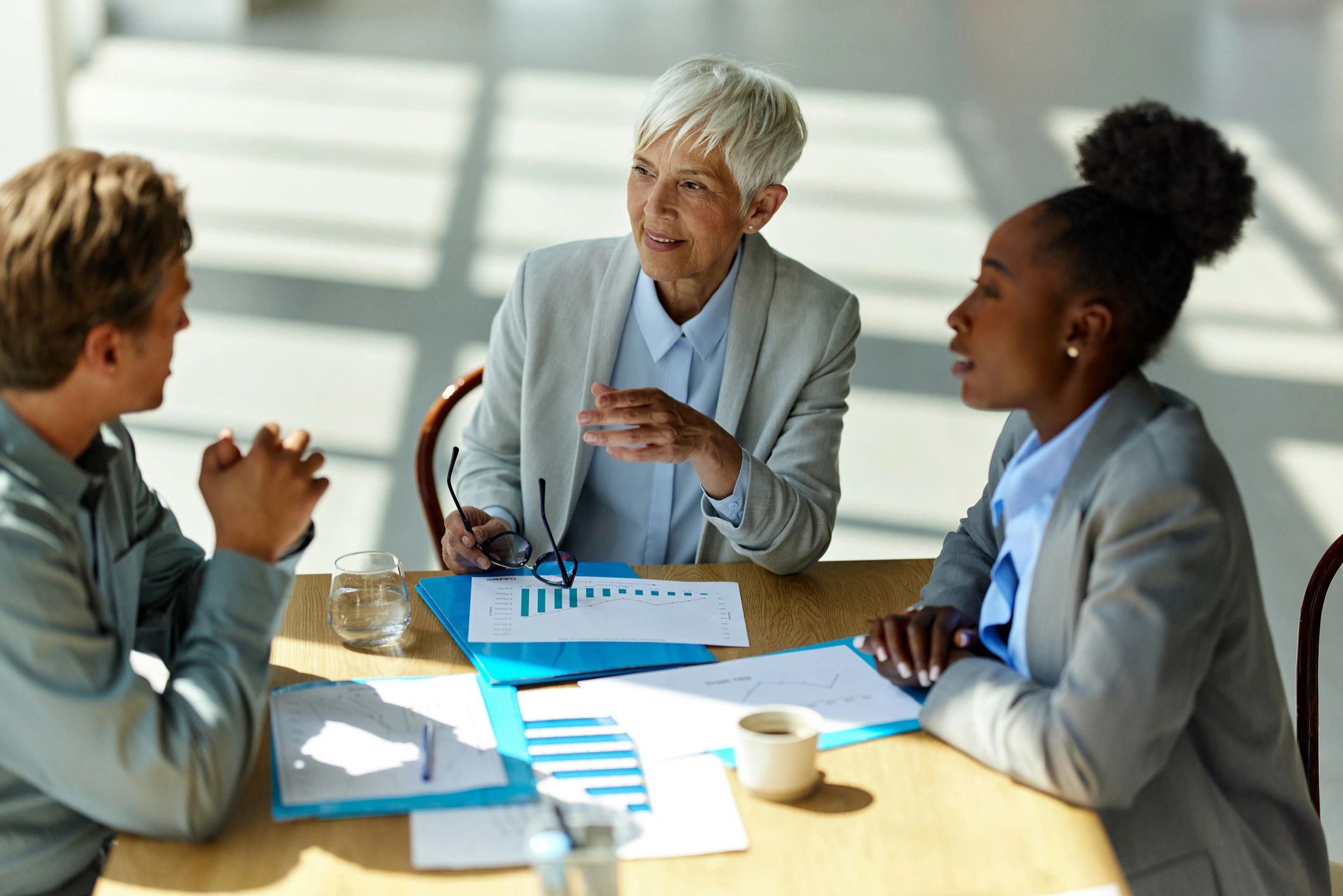 Financial services professionals in a strategy meeting