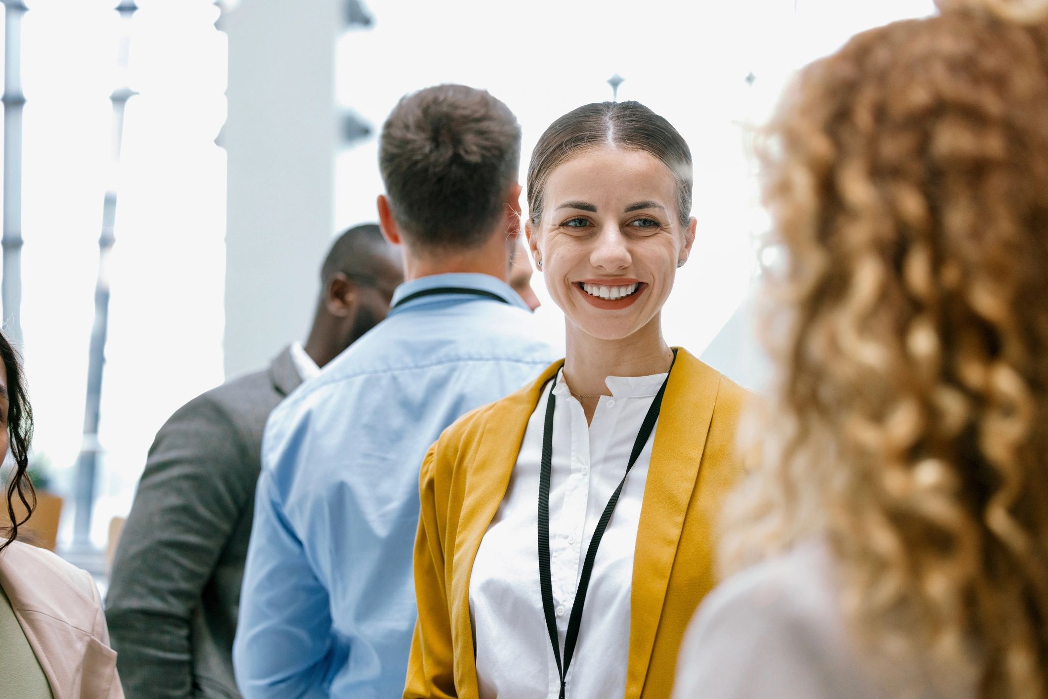 Professionals networking during a training event