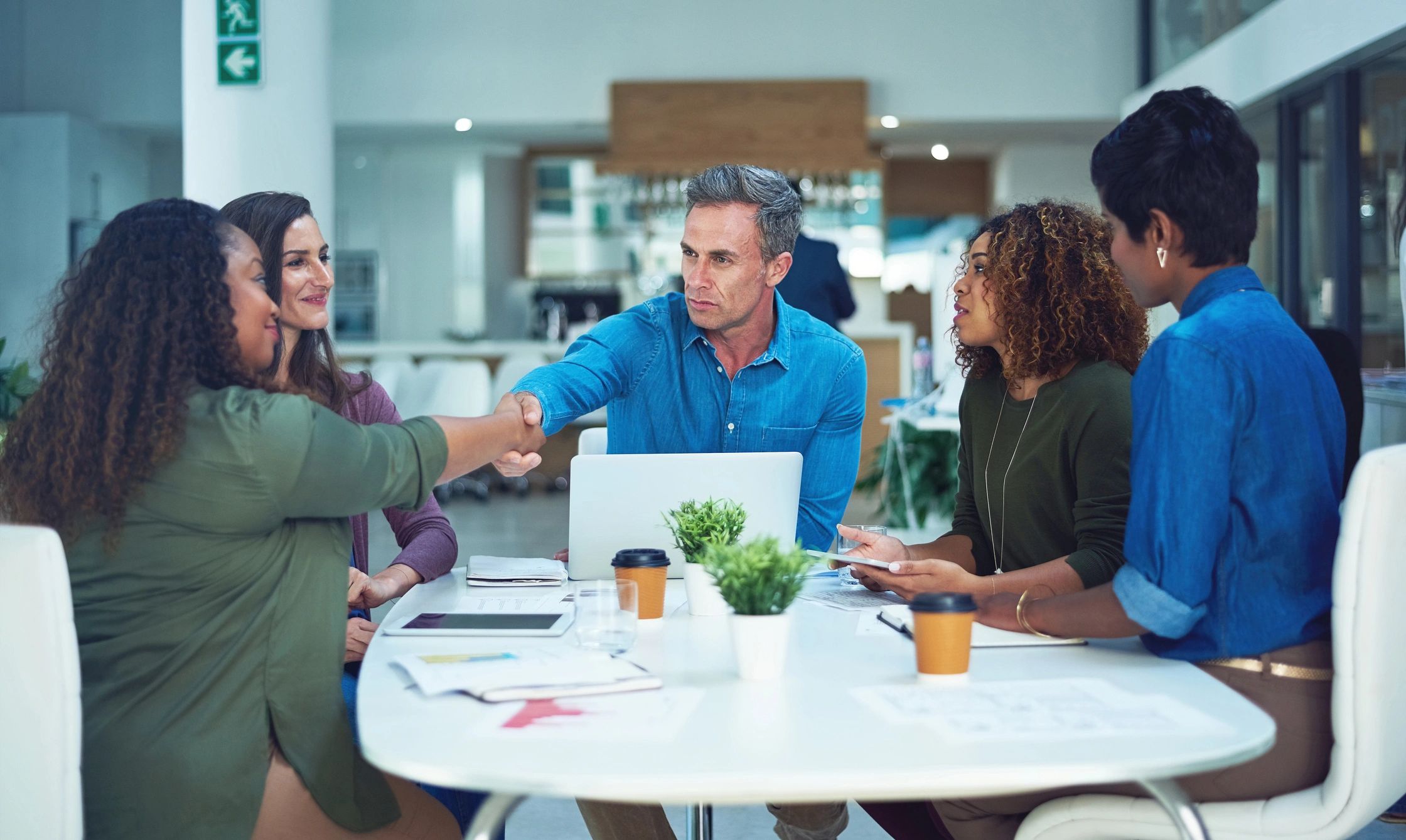 Professionals collaborating during a government strategy session